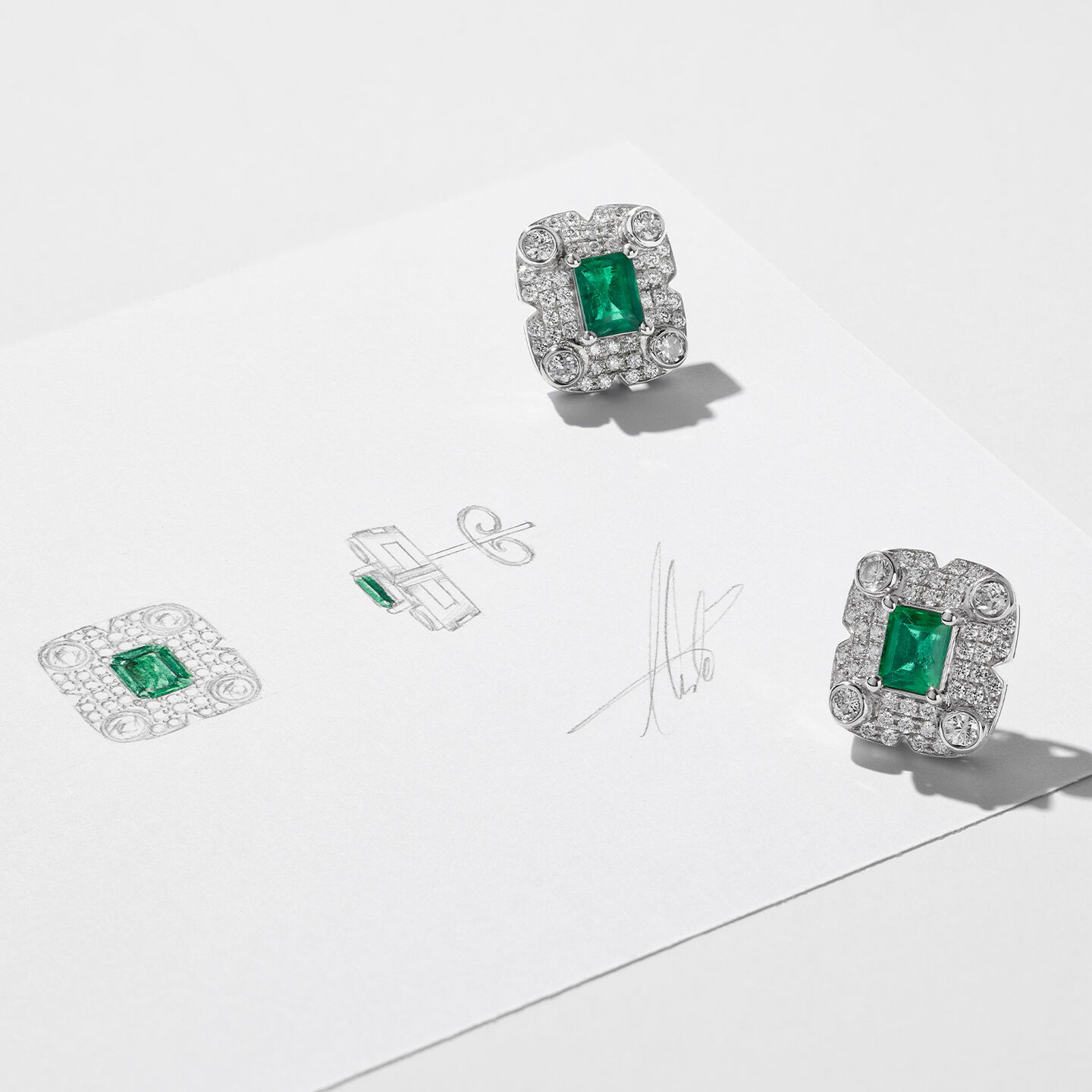 Maison Birks Bespoke diamond and emerald earrings.